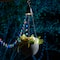 Glitzhome® 30" Black Solar Lighted Hanging Plastic Planters, 2ct.